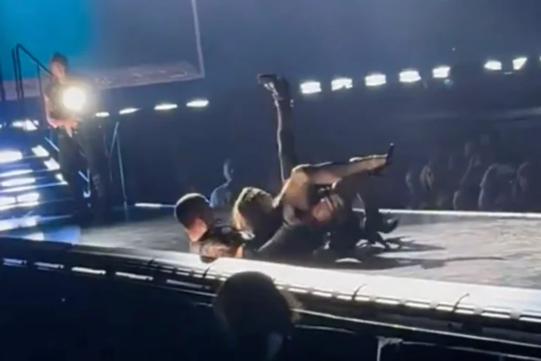Madonna falls off chair during Seattle concert. Video